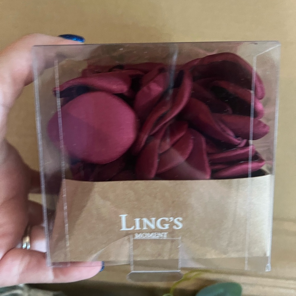 Ling’s Moment burgundy rose petals